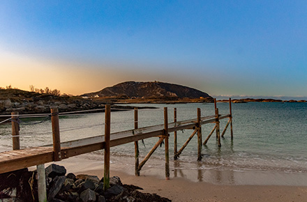 Bridge over the sand to the sea in Norway
